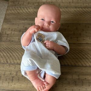 Adorable Baby Doll in Striped Outfit